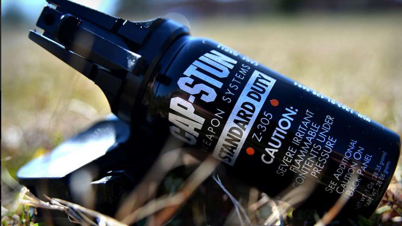 pepper spray in can on ground